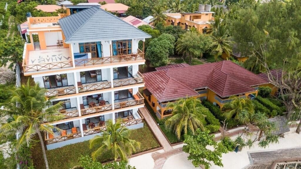 Апартаменты Mnarani Beach Cottages 4*