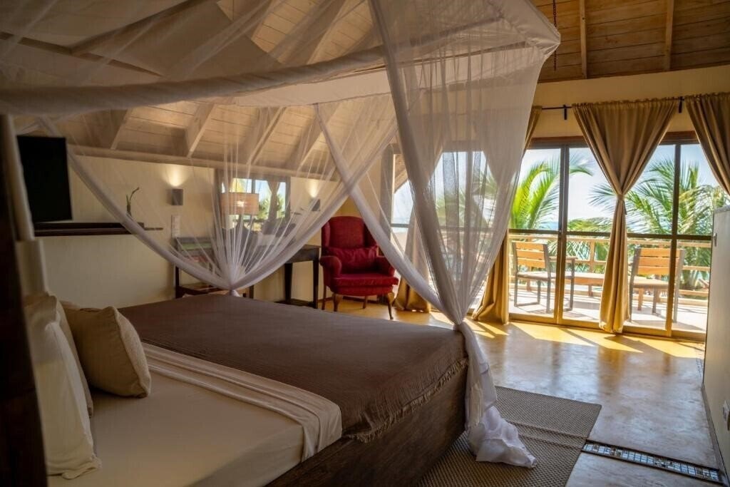 Фото Jambiani Villas 4*