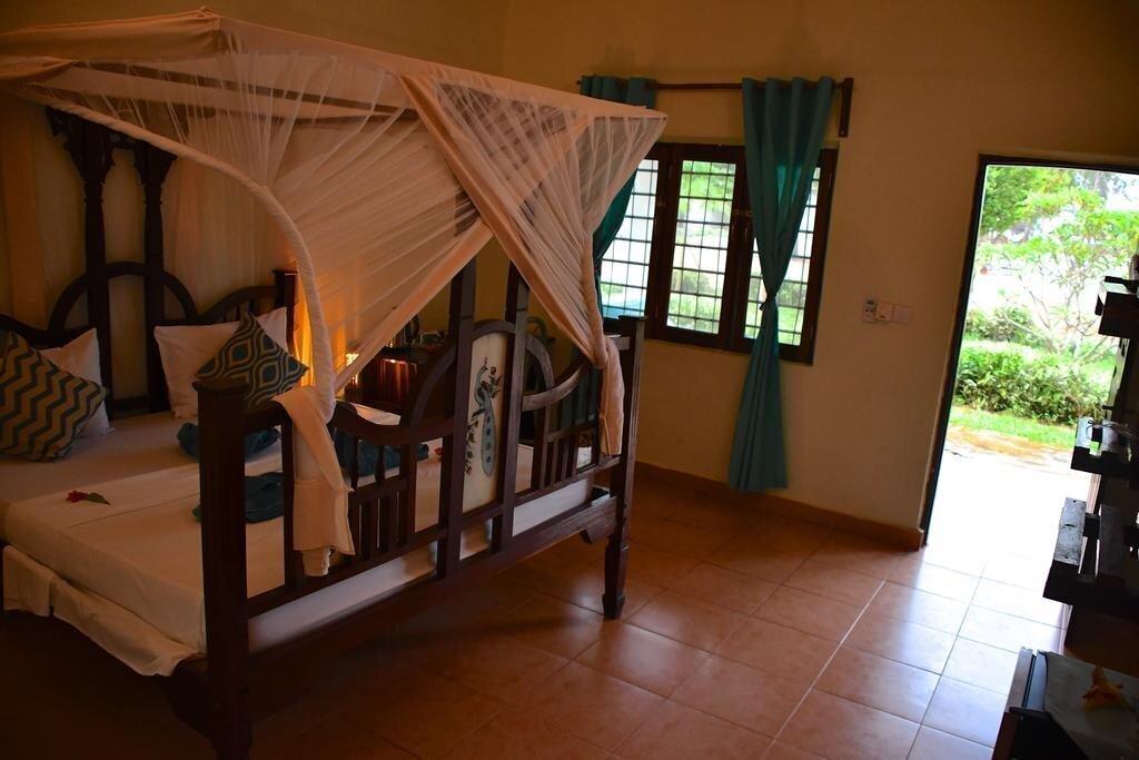 Апартаменты Kiwengwa Bungalow Boutique Resort 4*