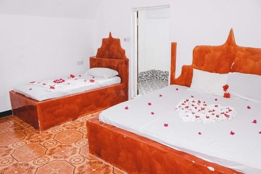 Фото New Jambo Bungalows 2*