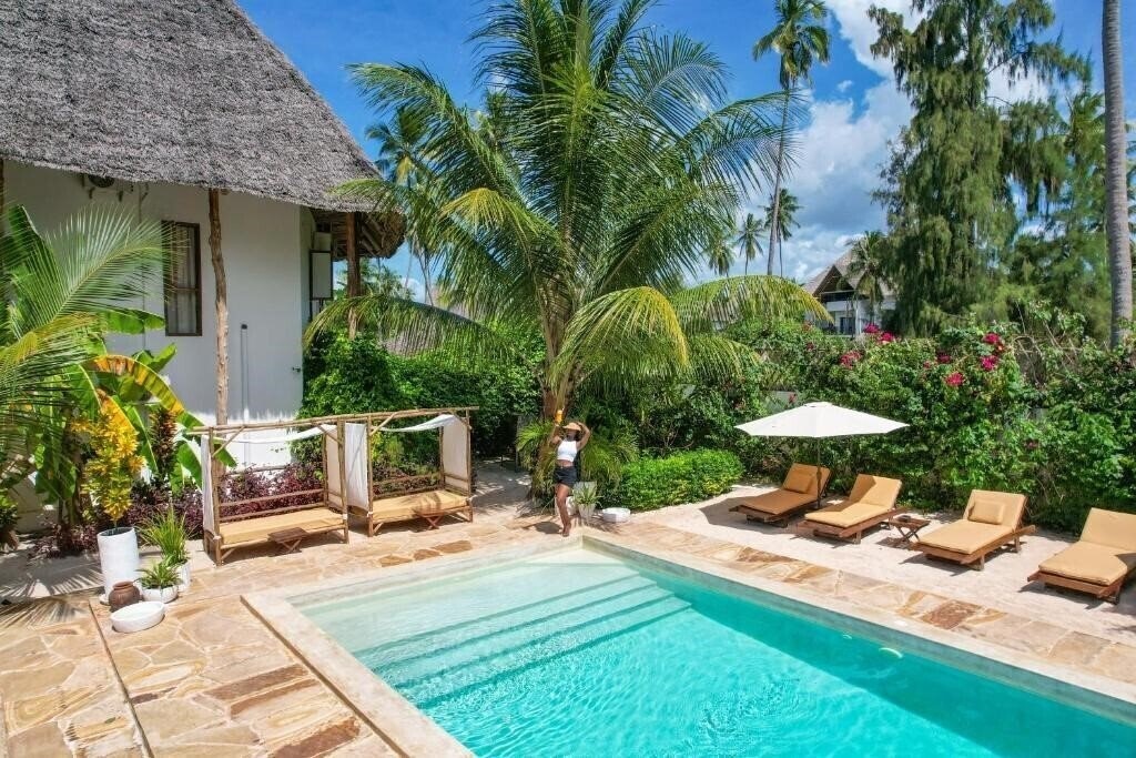 Фотографія Tamu Tamu Boutique Hotel 4*