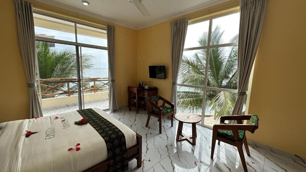 Вид Double A Nungwi Beach Hotel 4*