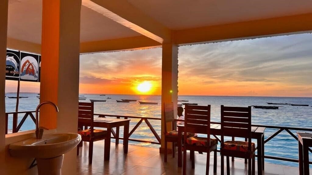 Апартаменти Double A Nungwi Beach Hotel 4*