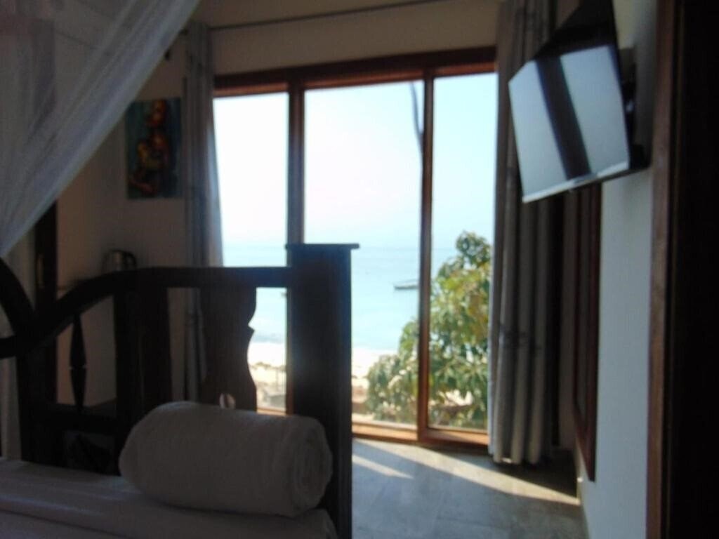 Фотография Boutique Ocean View Nungwi 4*