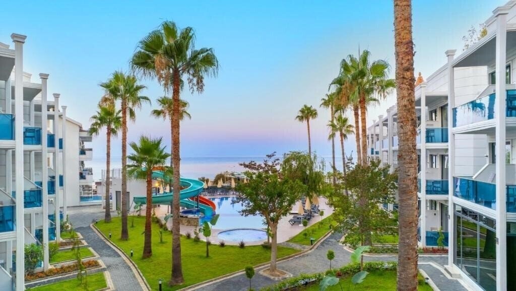 Фотографія Eflina Resort Hotel & SPA (ex. Alanya Ladies Garden Hotel, Lion Hotel, Club Rasputin, Club Eva Hotel, Club Fiesta, Iso Asi Turkler) 3*