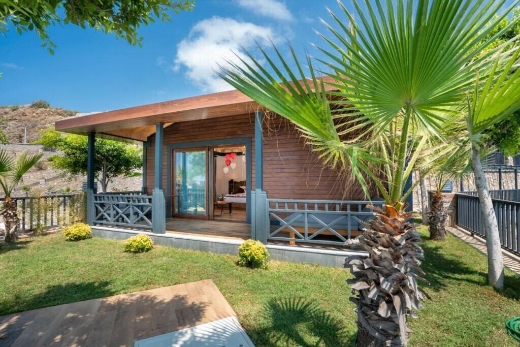 Фотографія Club Porto Amore Hotel 5*