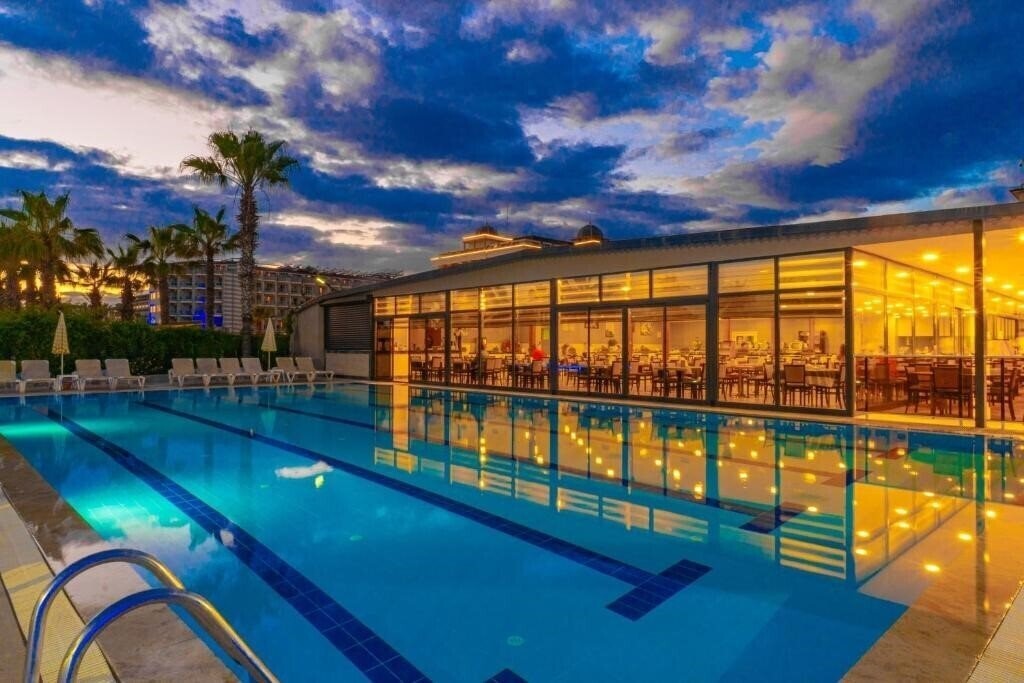 Вид Club Wasa Holiday Village (ex. Larissa Holiday Beach Club, Coralis Sun Queen Beach Hotel, Aska Sun Queen Beach Hotel, Sun Queen Beach) 4*