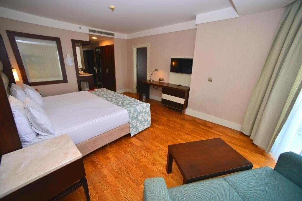 Апартаменты Ramada Plaza By Wyndham  Antalya (ex. Ramada Plaza Antalya) 5*