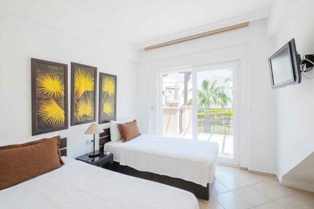 Апартаменты Clc World Apollonium Spa & Beach Resort 4*