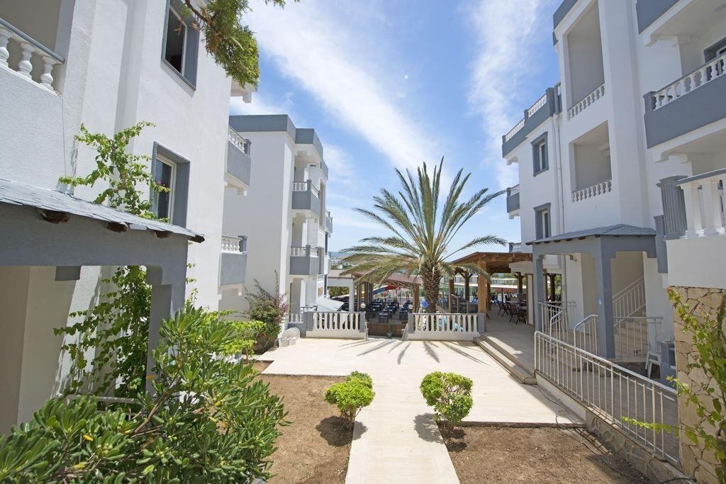 Фотография Smart Holiday Hotel Bodrum (ex. Bella Casa Hotel, Bellacasa Suites & Club, Costa Akkan Suites, Aura Hotel Bodrum) 4*