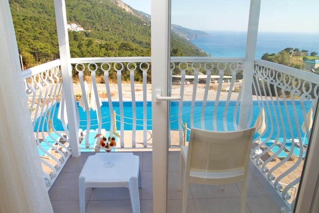 Вид Sertil Deluxe Hotel & SPA (ex. Tropical Suites by Sertil, Ramada by Wyndham Fethiye Oludeniz) 4*