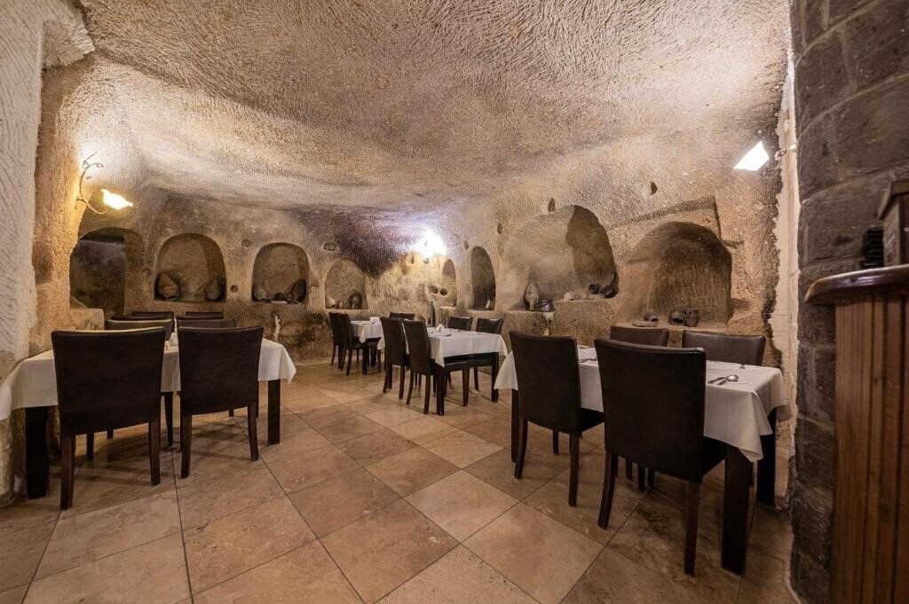 Фото Konak Bezirhane Cave Otel 3*