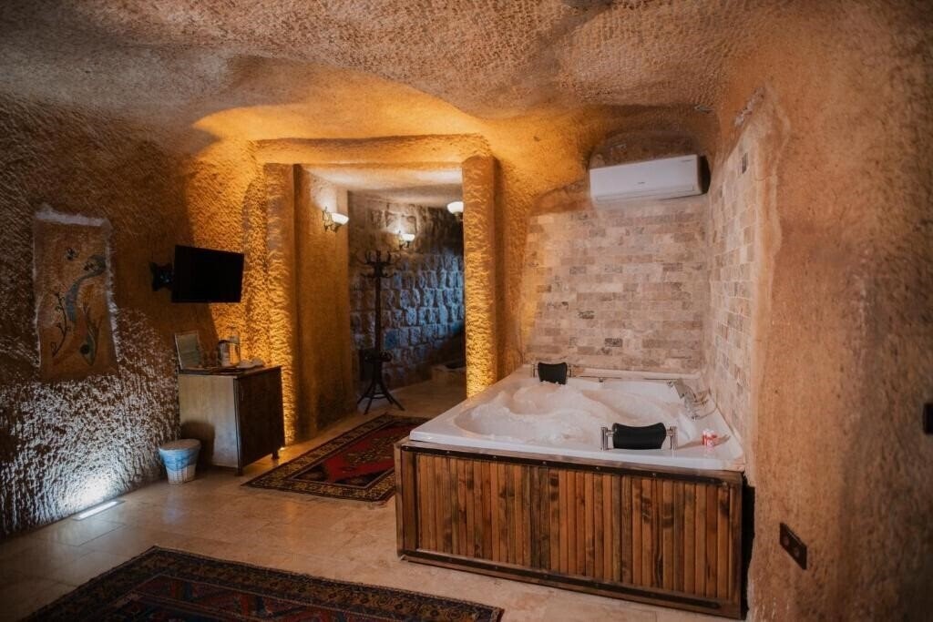 Апартаменты Cappadocia Cave Lodge 5*