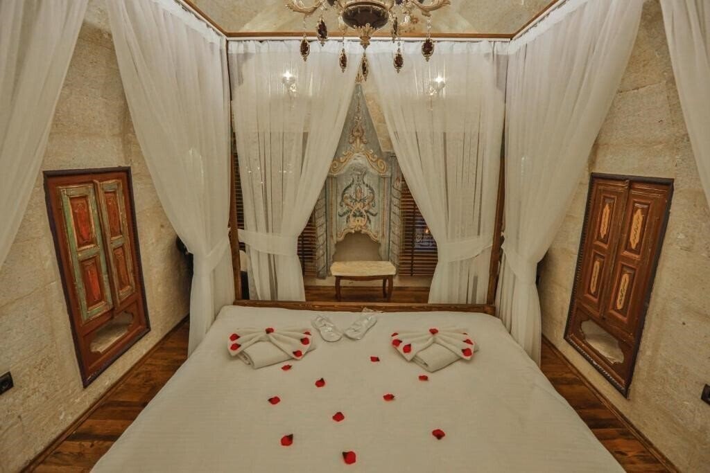 Апартаменты Casia Cave Suites 4*
