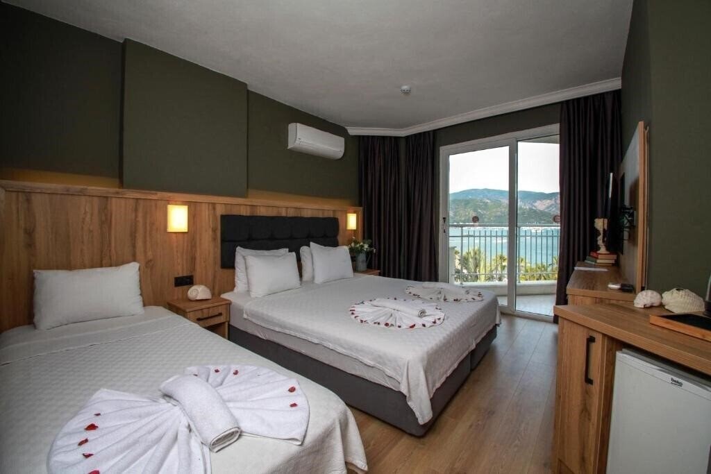 Фотографія Yuvam Hotel 3*