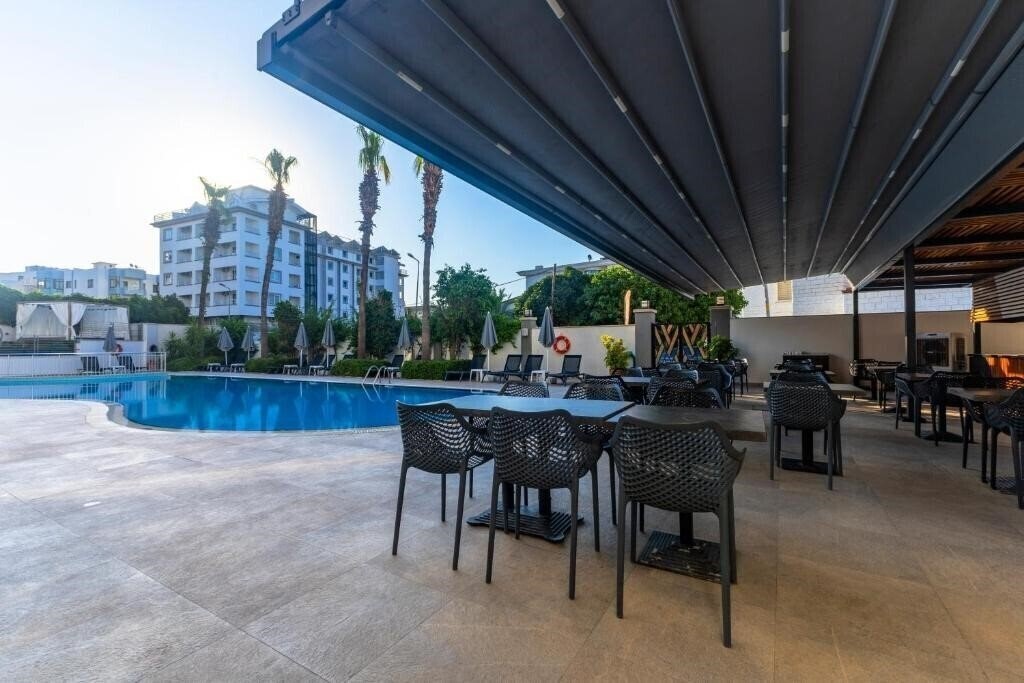 Фото Motto Premium Hotel 4*