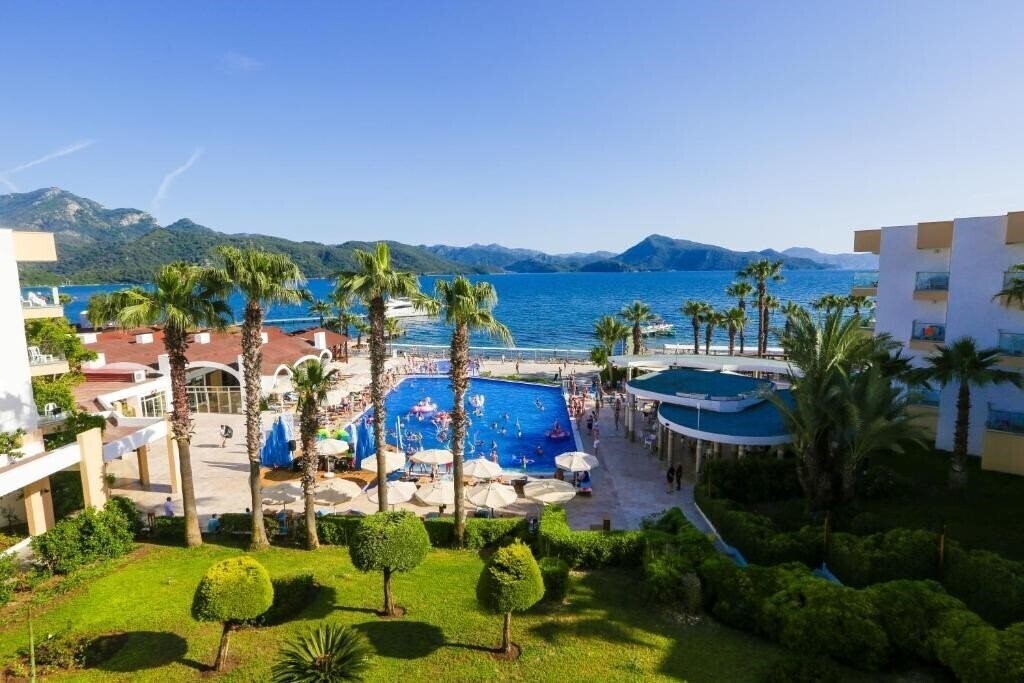 Фото Fortezza Beach Resort 5*