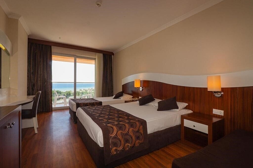 Фото Throne Beach Resort & SPA (ex. Nilbahir Resort & Spa) 5*