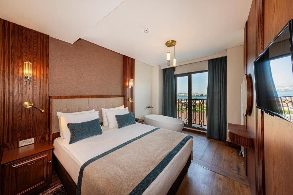 Фотографія Triton Hotel (ex. Azade Hotel, Best Western Obelisk) 4*