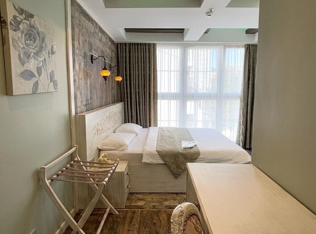 Фото Elegance Asia Hotel 3*