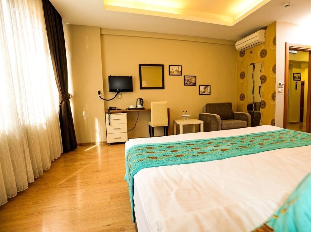 Фотографія Taksim Plussuite Hotel 3*