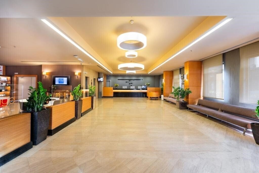 Апартаменты Midtown Hotel 4*