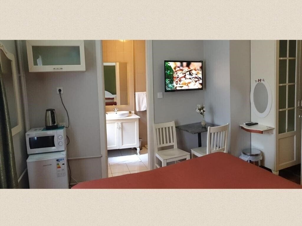 Фотография Hotel Taksim Home (ex. Away Suites Boutique, Uslan Residence) 3*