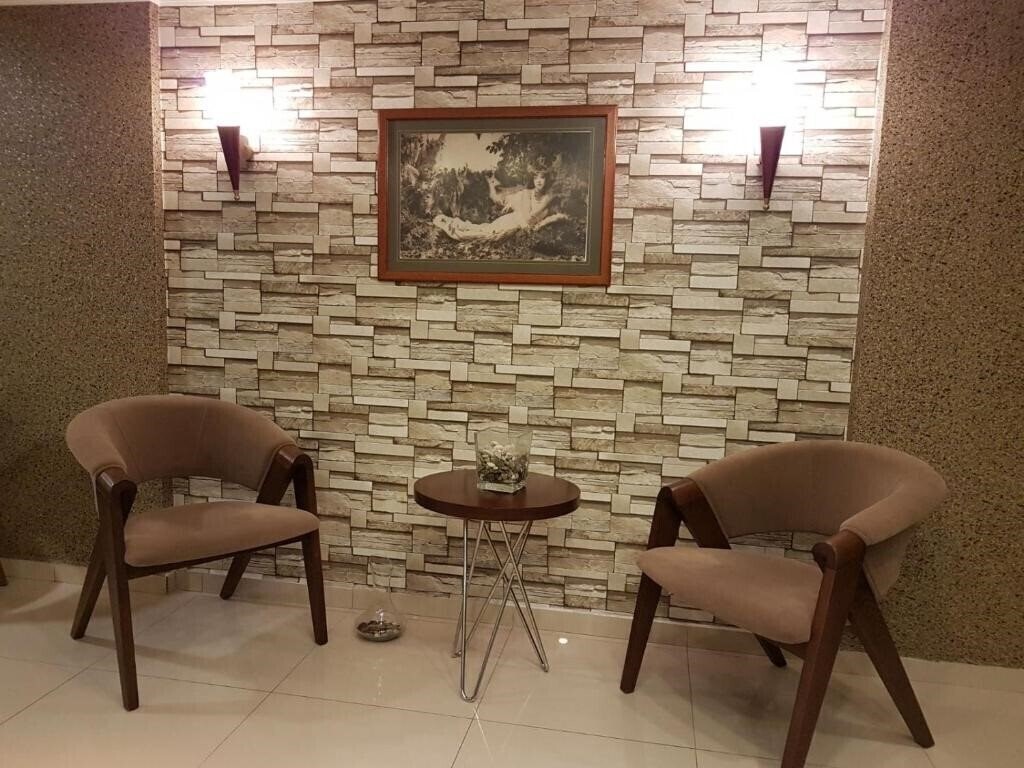 Панорама The Clock Suites 3*