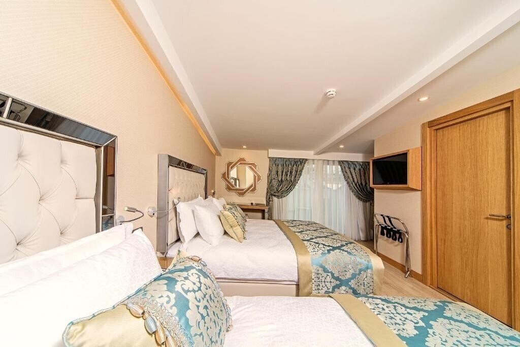 Фото Mukarnas Taksim Boutique Hotel 4*