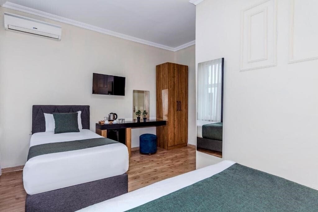 Фотография La Pera Suites 3*