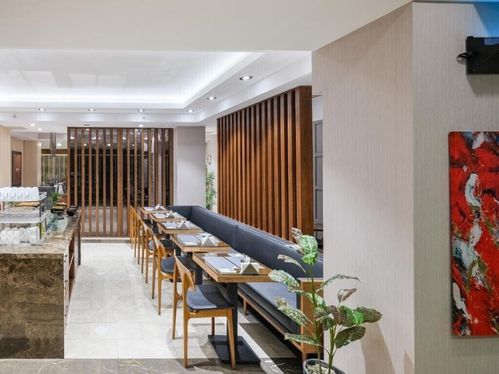 Апартаменты Merlin Hotel 4*