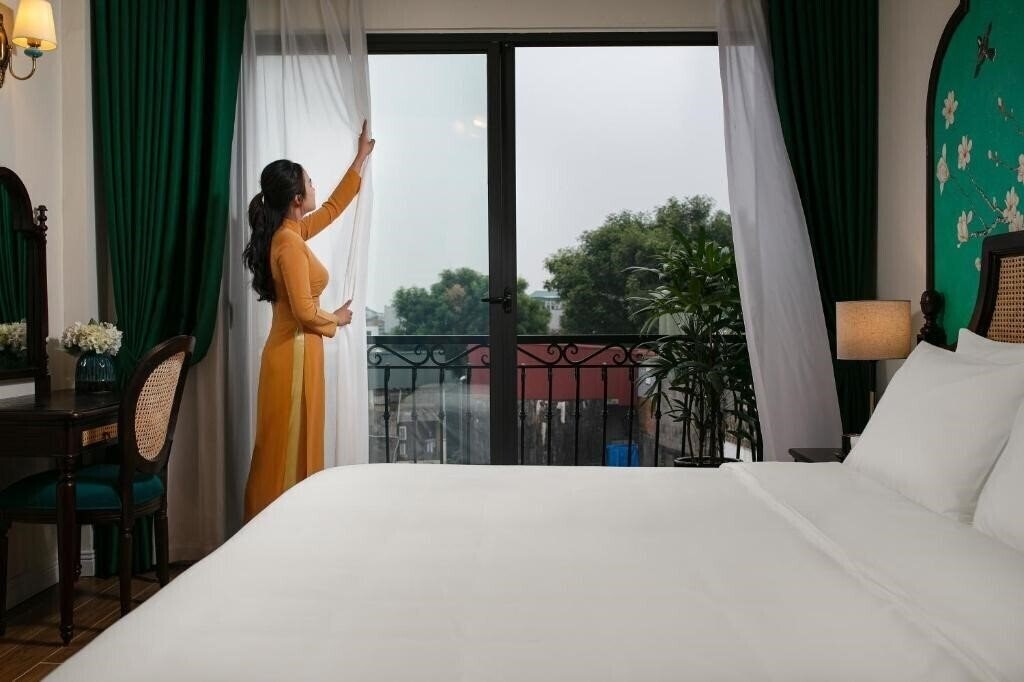 Фотографія La Passion Hanoi Hotel & Apartment 3*