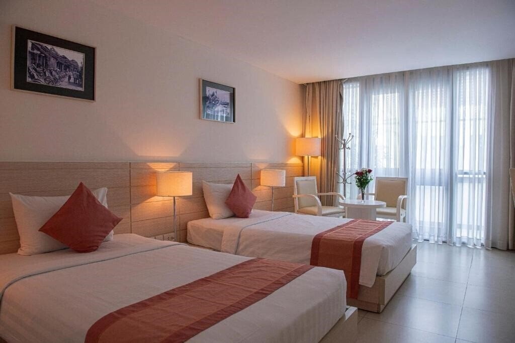 Апартаменты Nhi Phi Hotel 3*